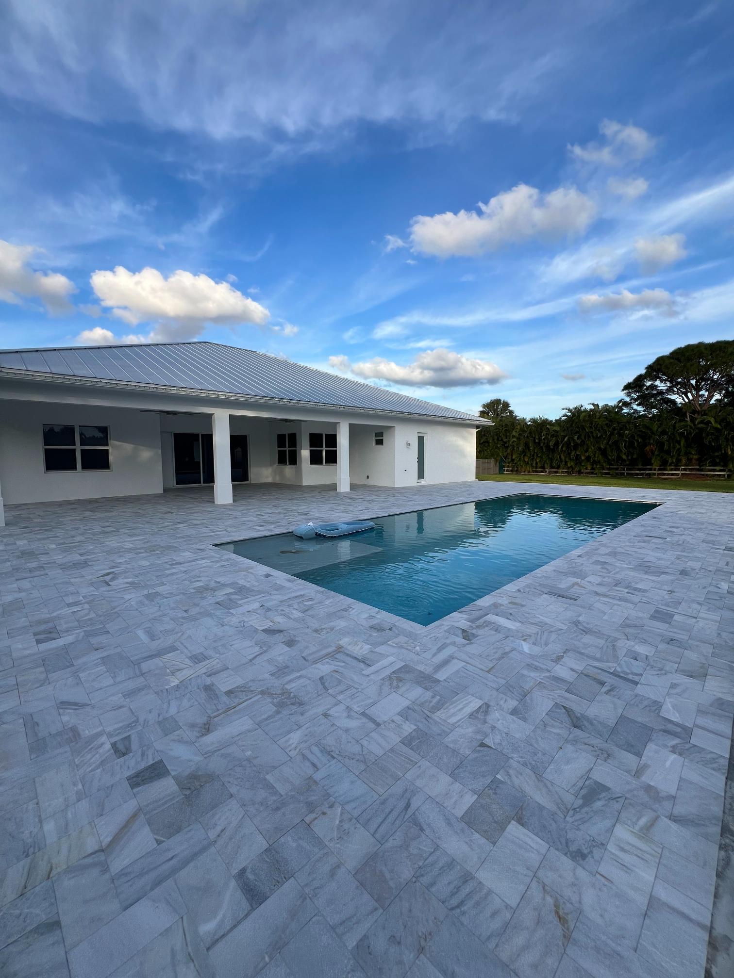 Pool deck pavers - Flat Earth Hardscapes